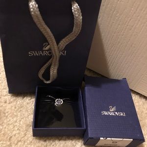 Brand new Swarovski necklace w/ light purple stud